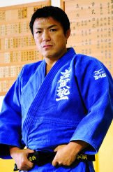 古賀 稔彦 氏